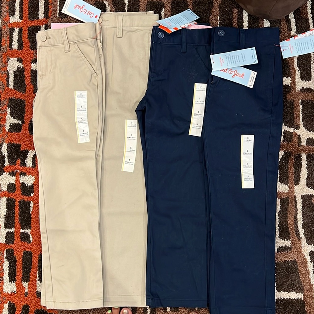 School Uniforms two of them are girls size 5 and two are size 5 unisex.